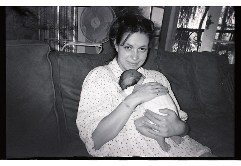 Woman holding her newborn baby