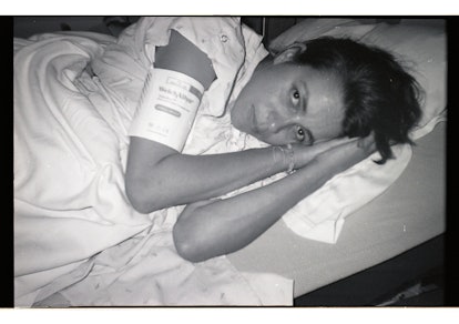 Woman in labor laying in a hospital bed