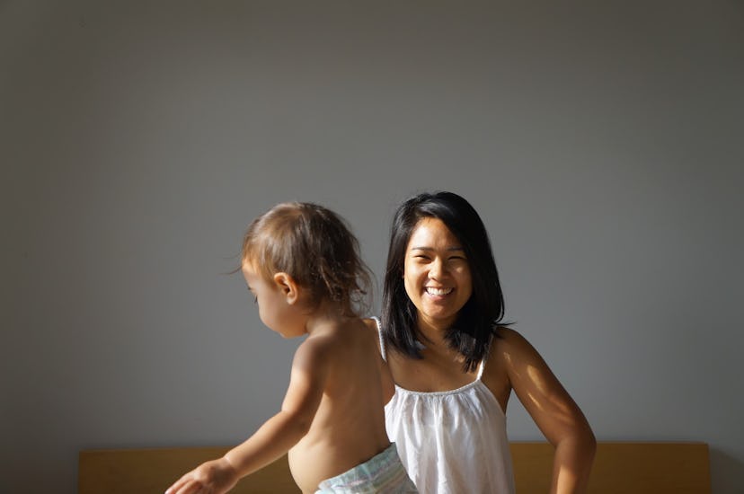 Loreann Talbo with her toddler, smiling