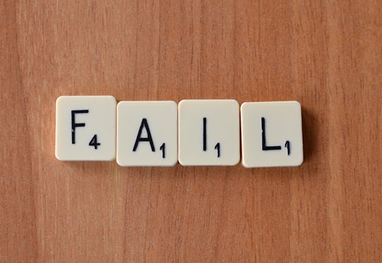 Scrabble letters spelling out the word fail