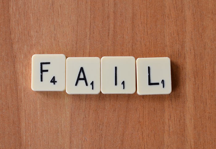 Scrabble letters spelling out the word fail