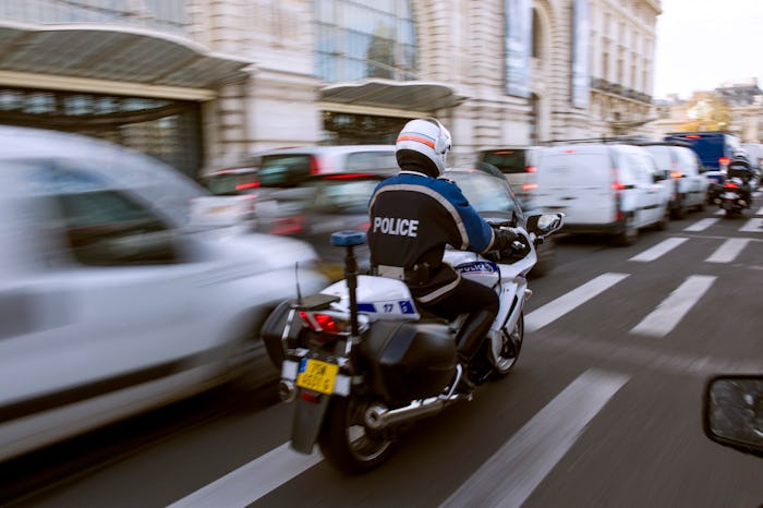 French policeman riding a police motorcycle