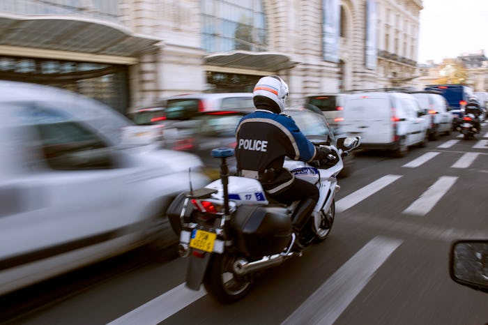 French policeman riding a police motorcycle 