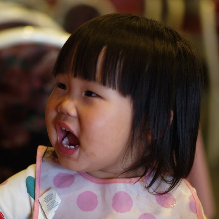 Toddler having a tantrum at a restaurant