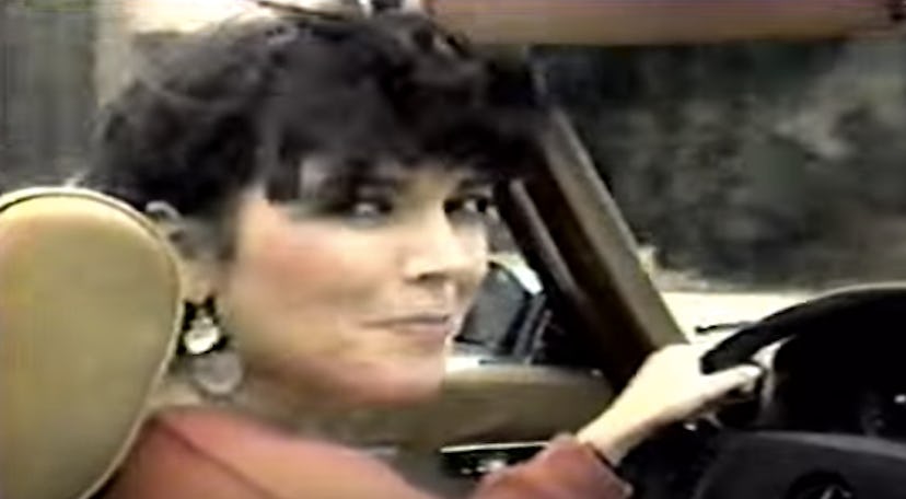 Image of young Kris Jenner driving a car