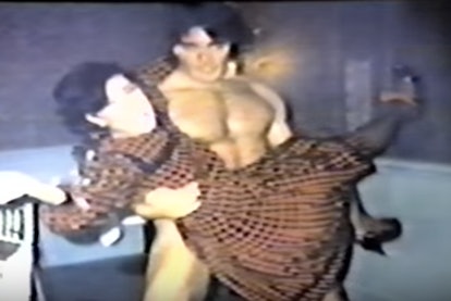 A naked man holding Kris Jenner 