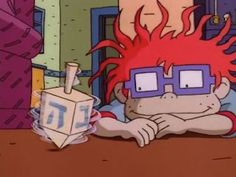 A scene from A Rugrats Chanukah episode, where one of the characters with red hair is playing