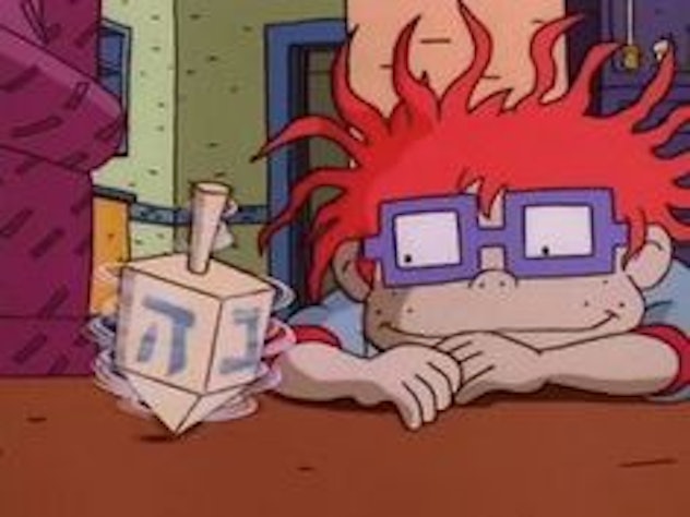 A scene from A Rugrats Chanukah episode, where one of the characters with red hair is playing