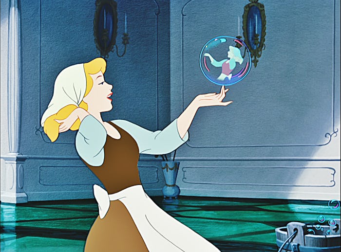 Cinderella sitting on floor while cleaning her house