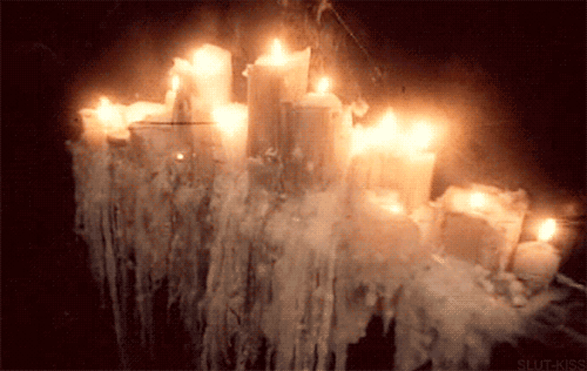 A gif showing many candles burning