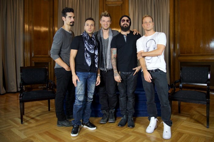 The members of The Backstreet Boys boy band posing together after having a reunion years later