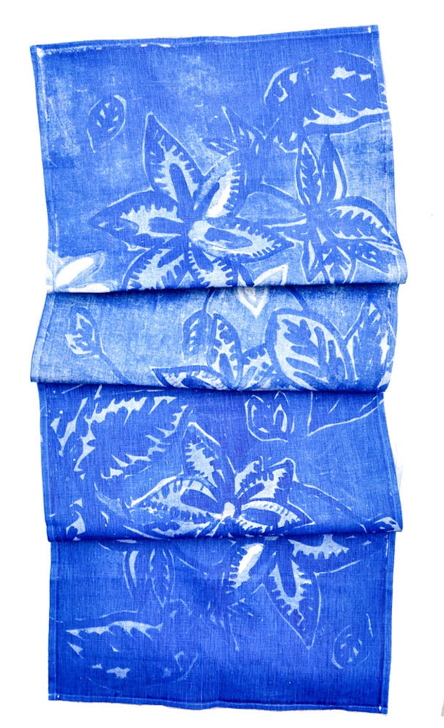 A blue floral table runner 