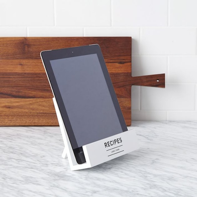 An iPad in the cookbook stand 