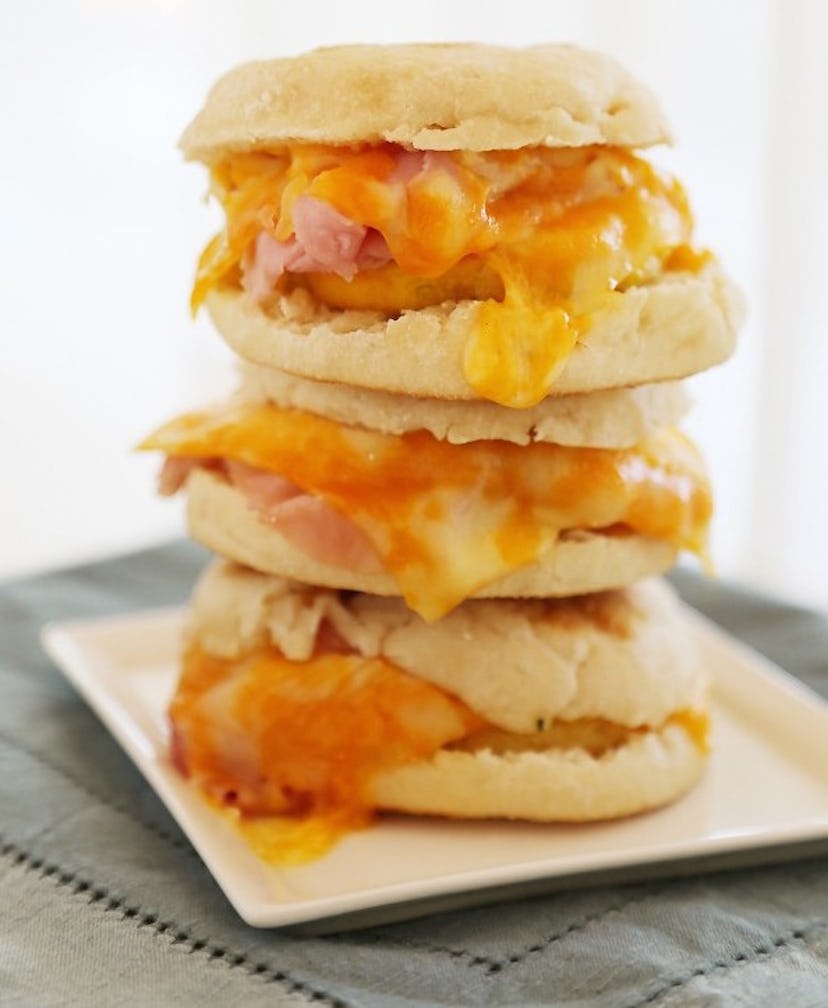 Three freezer breakfast sandwiches stacked on top of each other