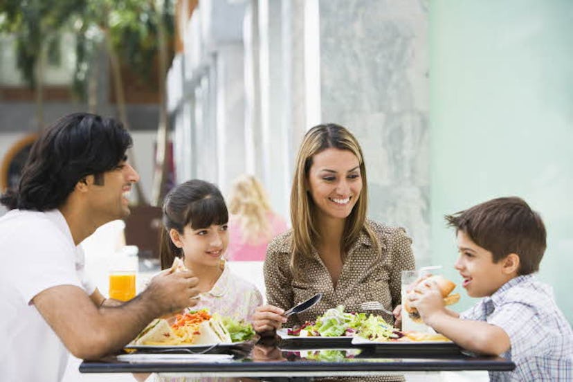Image of a family of four on a lunch
