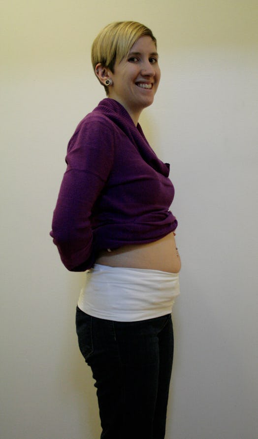 Skinny-shamed pregnant woman showing her stomach