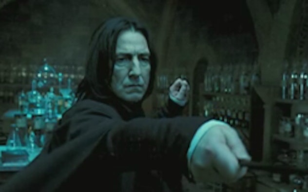 Snape holding a stick in Harry Potter