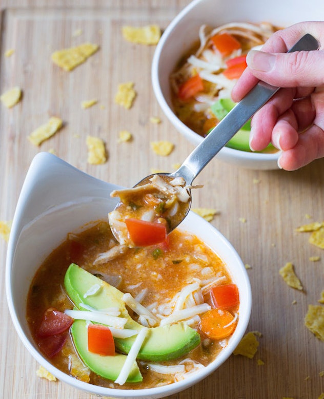 Two bowls of Chicken Tortilla Soup with avocado