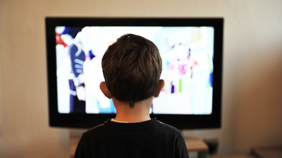 kid watching tv