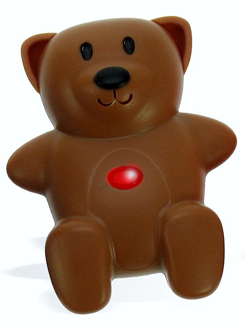 A brown teddy bear with a red light on its stomach that serves as a child locator device