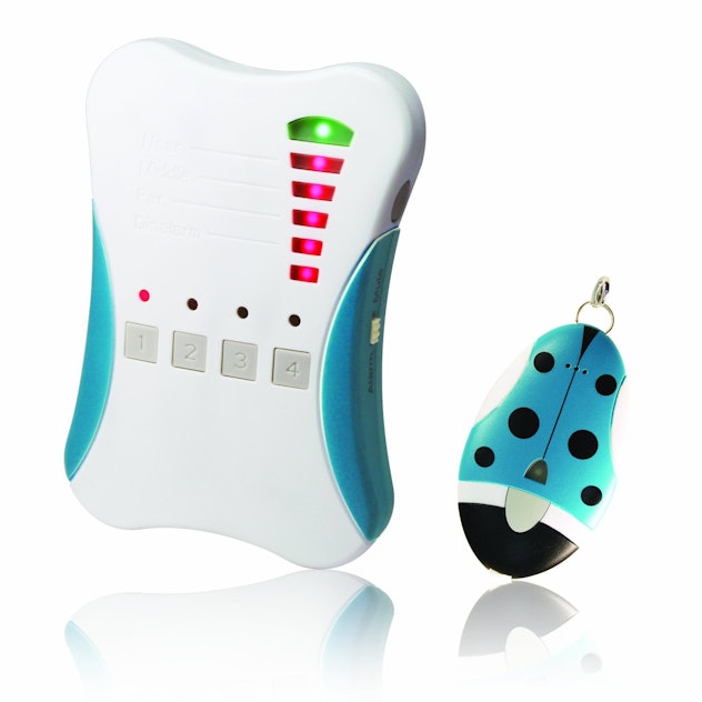 Blue and white electronic kid tracker that clips onto a child's clothing with a panic button on the ...