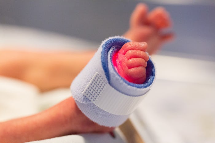 A close-up of a prematurely born baby's feet