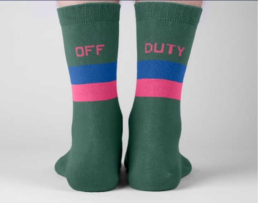 Green socks with blue and pink stripes