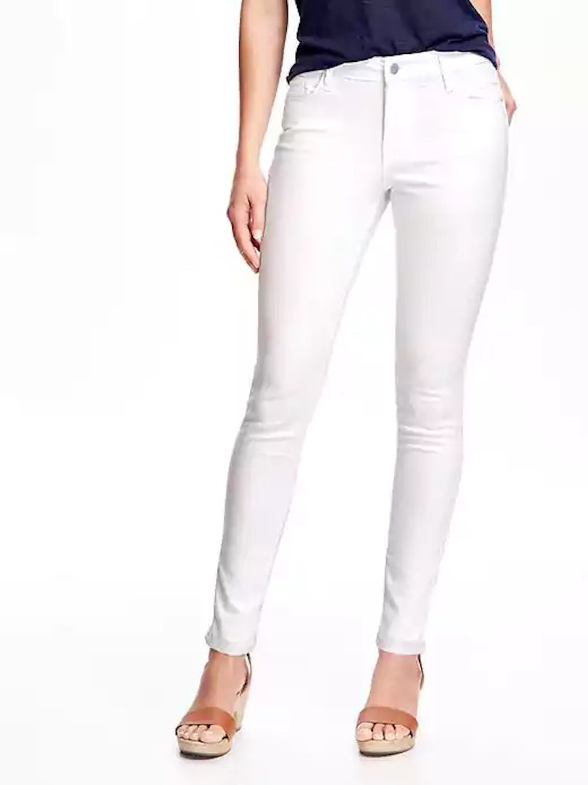 Woman wearing white jeans