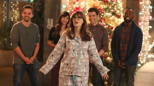 The cast of New Girl in their pajamas in a scene of a Christmas episode on the show