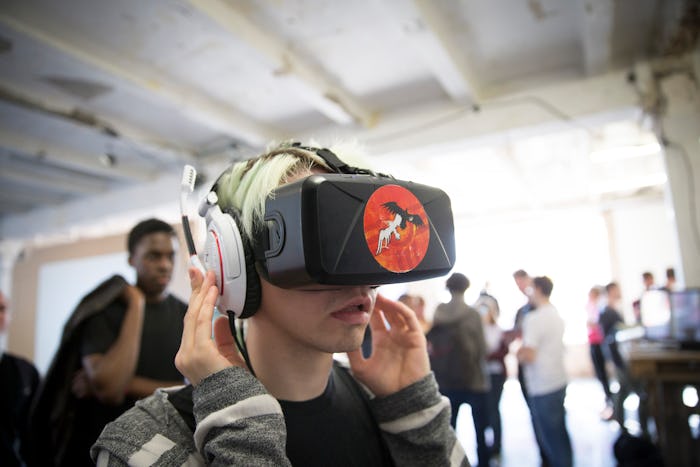 A boy having a virtual reality headset on his head