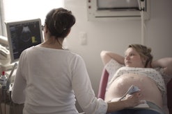 Pregnant women getting ultrasound done