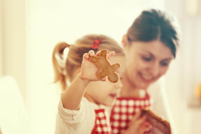 A single mom making gingerbread cookies with her mom 