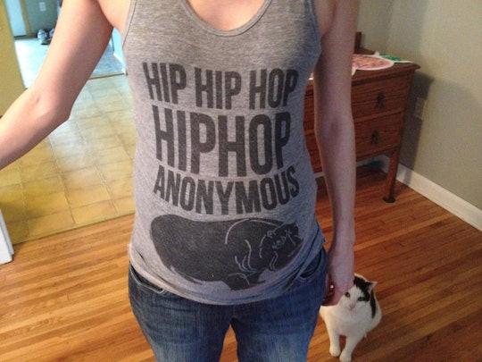 Pregnant woman with hemorrhoid's wearing a hip hop anonymous shirt