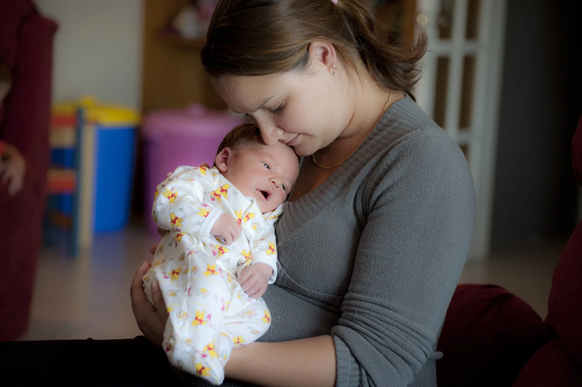 The Postpartum Milestones You'll Reach, A Month By Month Guide