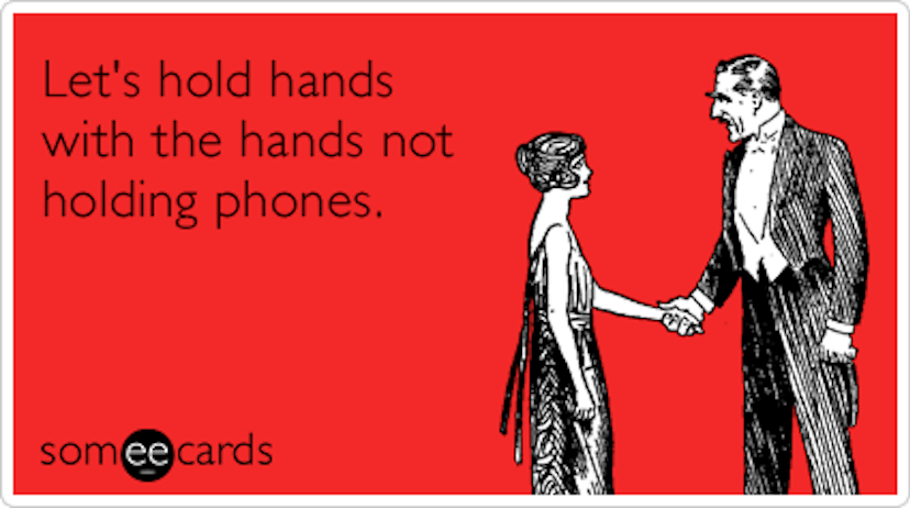 A someecard with "let's hold hands with the hands not holding phones"