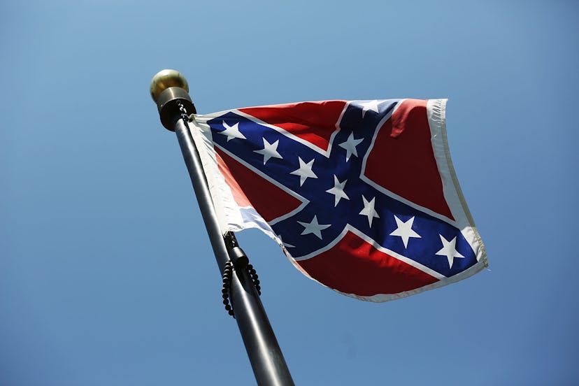 A Confederate flag waving on the wind