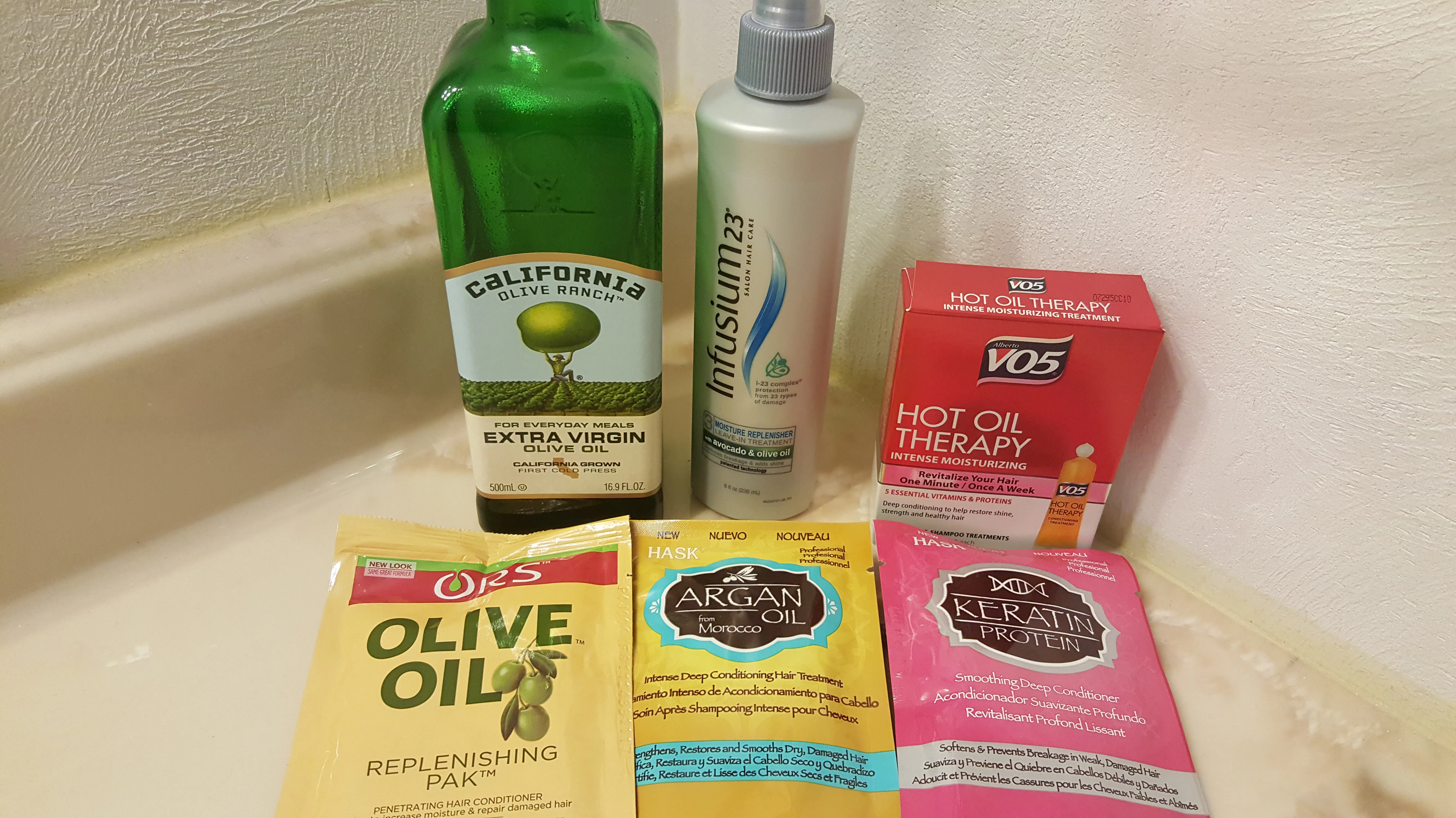 I Used Olive Oil Hair Treatments For A Week & Here's What Happened