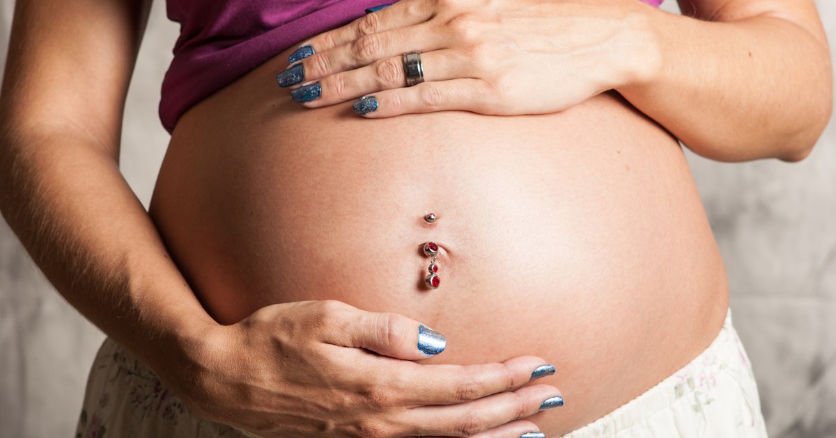 Can You Keep Your Belly Button Ring During Pregnancy? That's Up To You &  Your Bump Can You Keep Your Belly Button Ring During Pregnancy? That's Up To You &  Your Bump