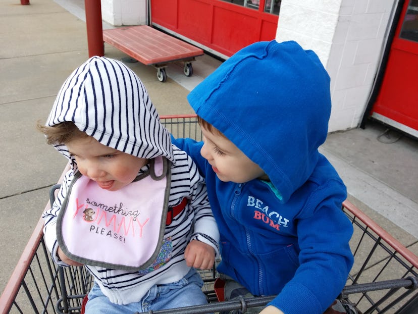 Emily Hall's daughter and son sitting in a shopping cart