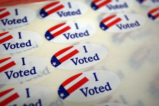 "I Voted" stickers lined up above one another