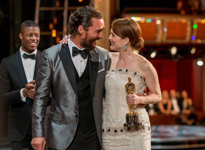 Matthew McConaughey hugs Julianne Moore at the 87th Annual Academy Awards 