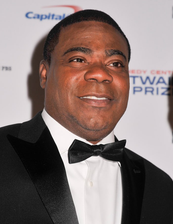 Tracy Morgan in a white button-up with a black blazer and bow tie at the Oscars