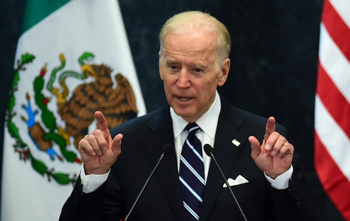 Joe Biden during his speech in front of Mexican and USA flags