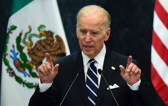 Joe Biden during his speech in front of Mexican and USA flags