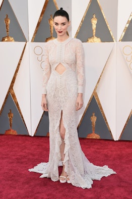 Rooney Mara posing in a white gown at Oscars