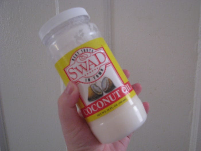 A jar of coconut oil, useful for stretch marks
