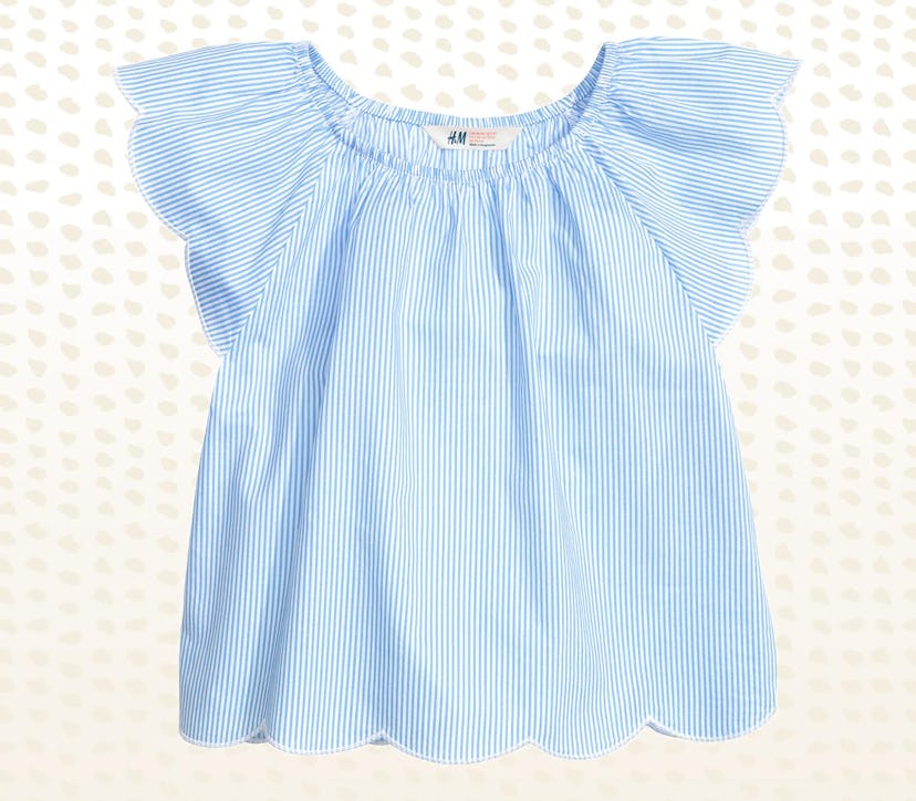 A blue top with ruffled sleeves