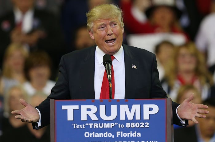 Donald Trump gesturing while giving a speech.