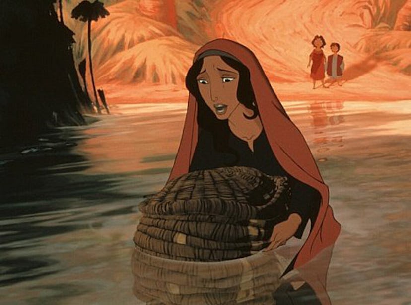 A woman crossing the river as she has moses in the basket 