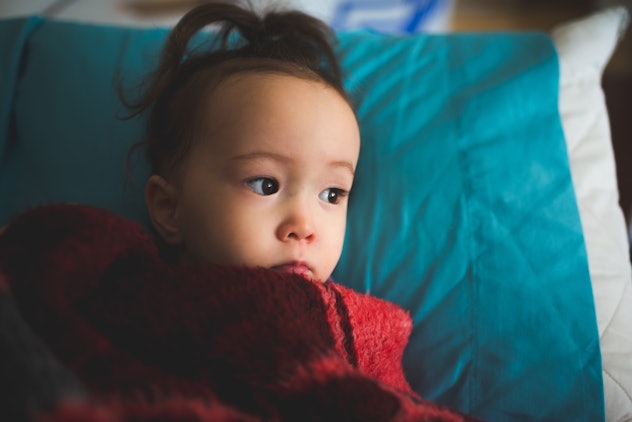 little girl on pillow